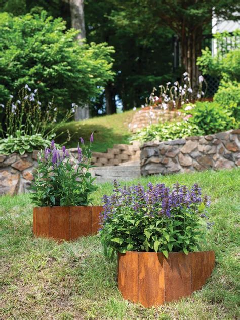 metal boxes on the hillside|built in hillside planter box.